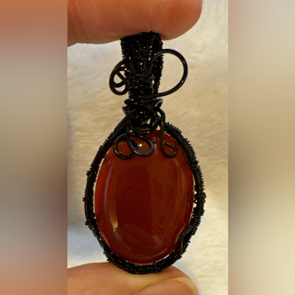 37.57 Carat Red Agate Pendant with Black Wire Wrap (jewelers grade wire)